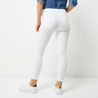 Petite white ripped Molly jeggings